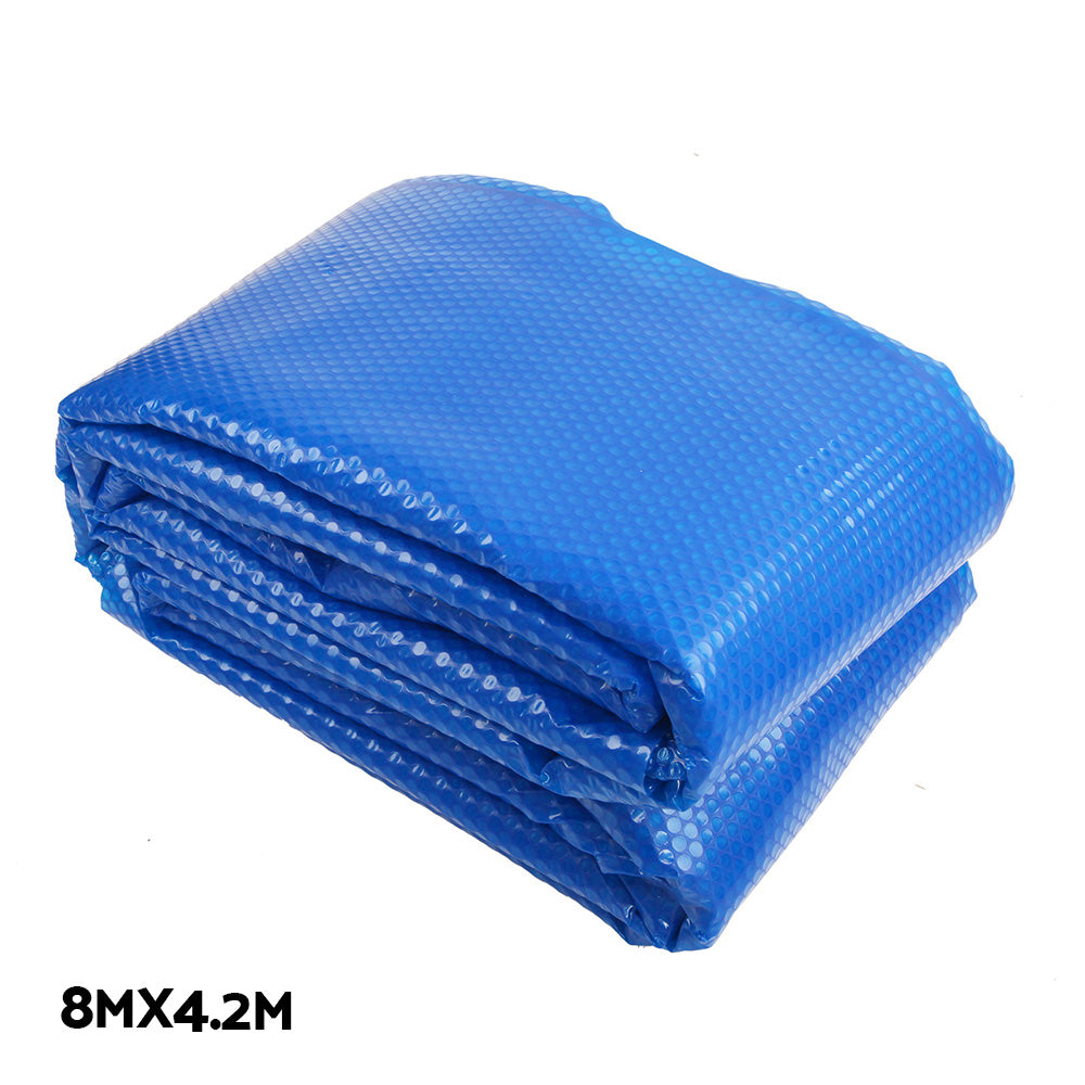 Aquabuddy 8x4.2m Pool Cover Roller Combo featuring a durable aluminium roller and a blue and silver solar blanket for effective pool maintenance.